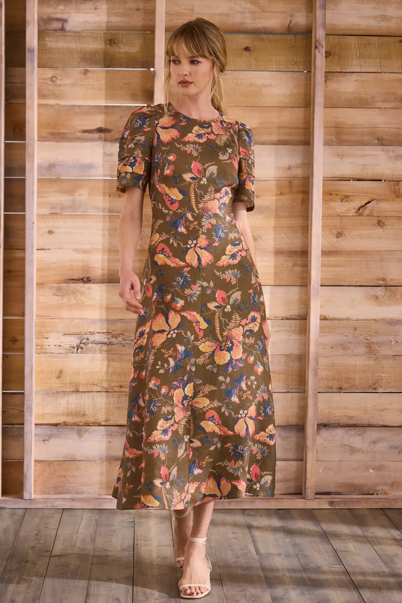Sheath midi dress with curved waist and relaxed skirt in Olive Floral print.