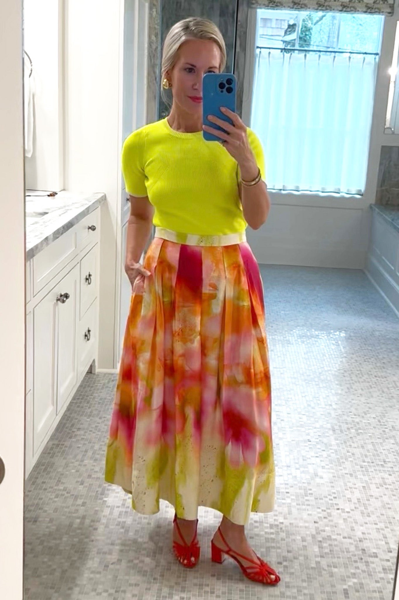 A fitted sweater-knit tee in vibrant neon yellow with a classic crew neckline and short sleeves.