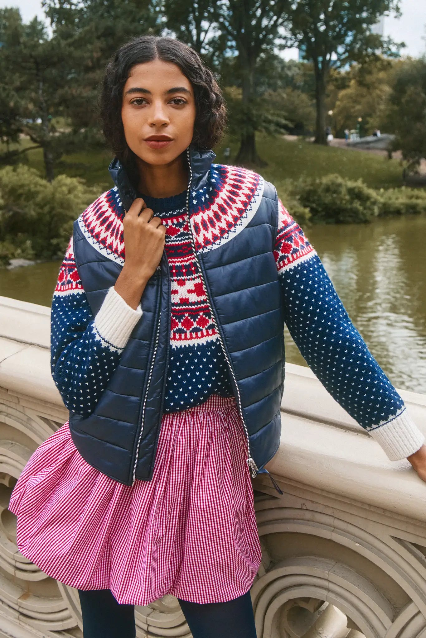 The Brady Vest is a elevated puffer with a collared neckline and a knitted Fair Isle yoke.