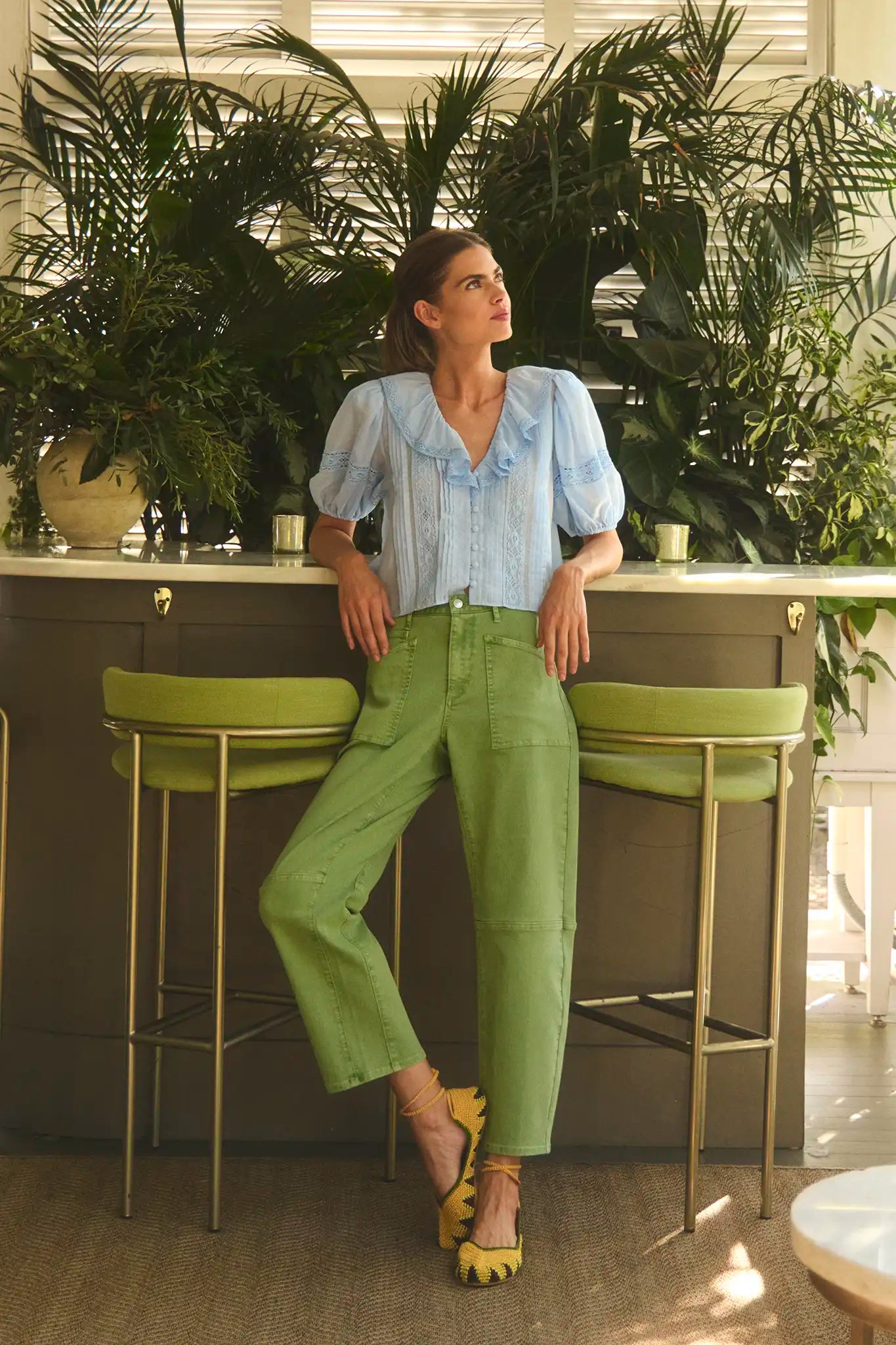 The Mallory Jean in leaf green denim paired with Mare Top in Sky Blue.