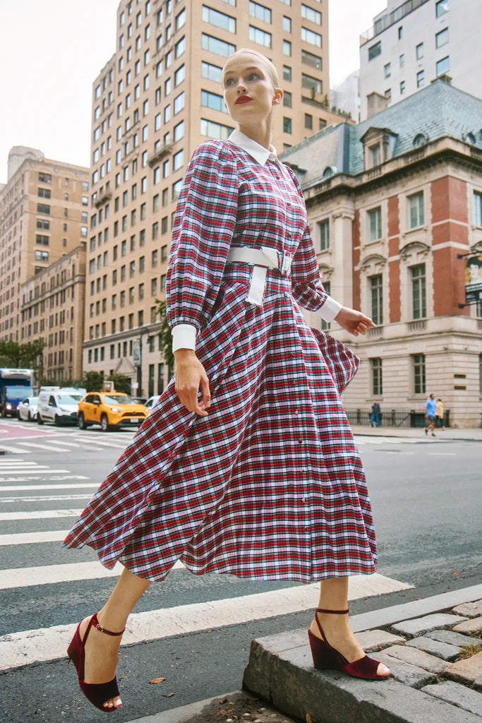 The Randolph Dress has a circle skirt, full length sleeves with button cuffs and optional belt.