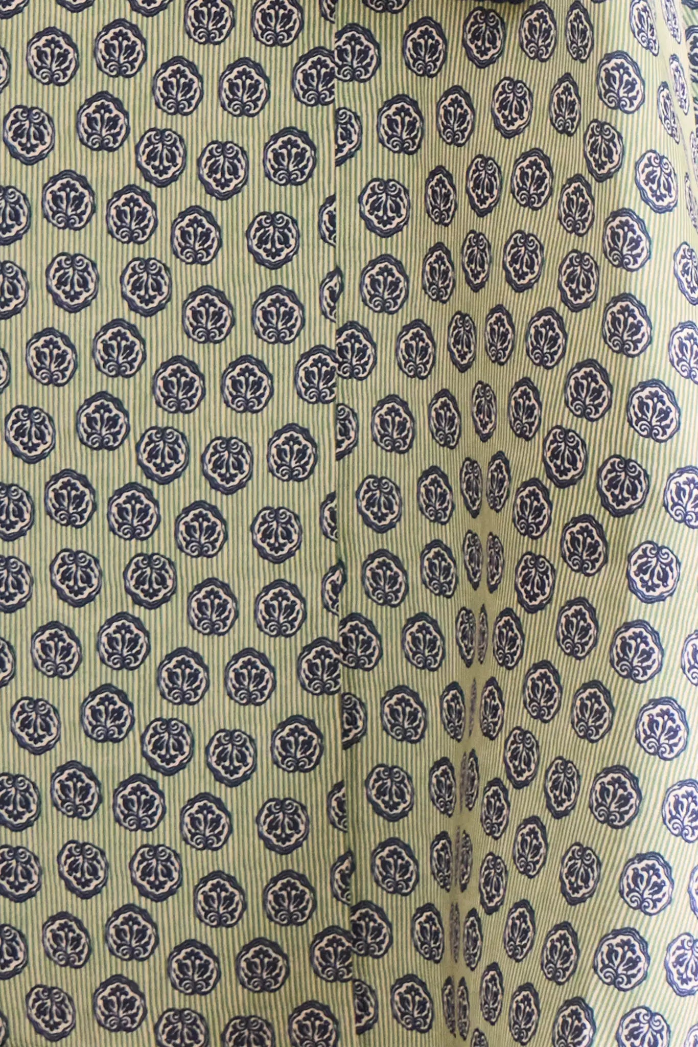 Navy Bird Block lightweight cotton sateen blouse with a relaxed collared silhouette & pintuck detail