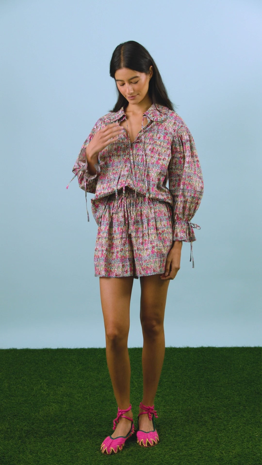 These Lura Shorts have a smocked waist and adjustable tie, made with Liberty Fabric.